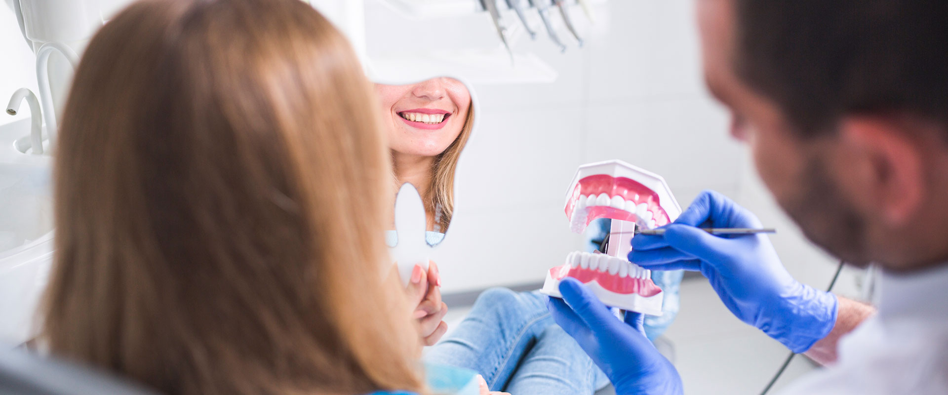 A Dentist Explaining the dental procedure to patient